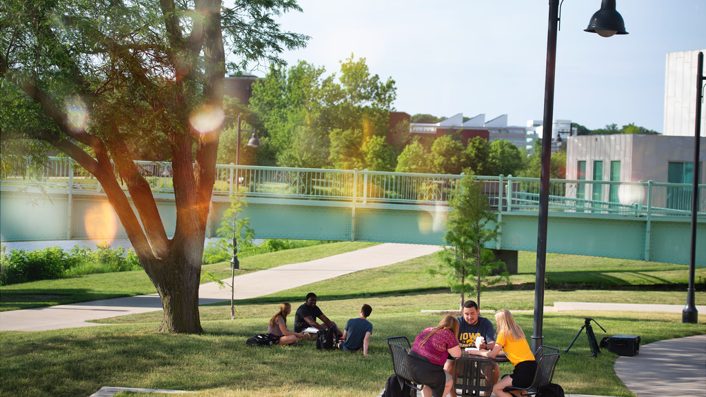 Students studying outdoors at Iowa Memorial Union